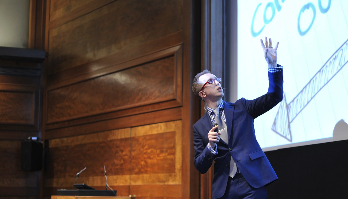 Event Host Phil Lewis on stage
